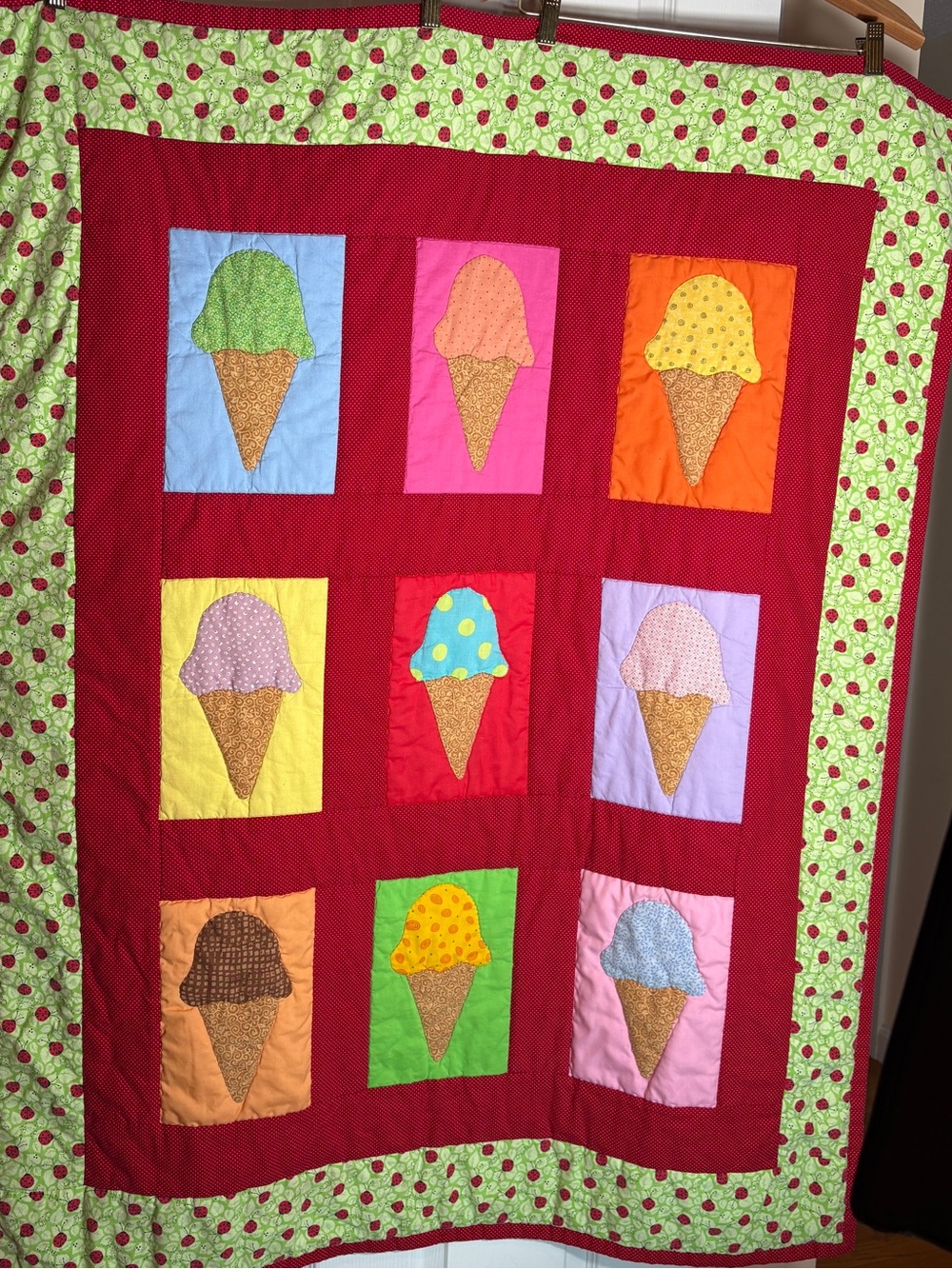Ice Cream Cone Quilt w/Lady Bug Border & Red backing w/white hearts 49” x 38”